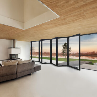 Cortizo Bi-Fold Plus aluminum window exterior view with panels fully folded open